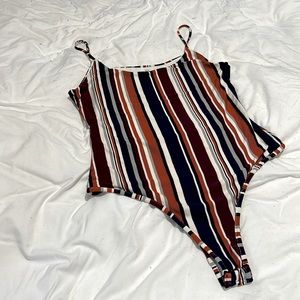 Stripped bodysuit. Cotton material. Fit snugged.